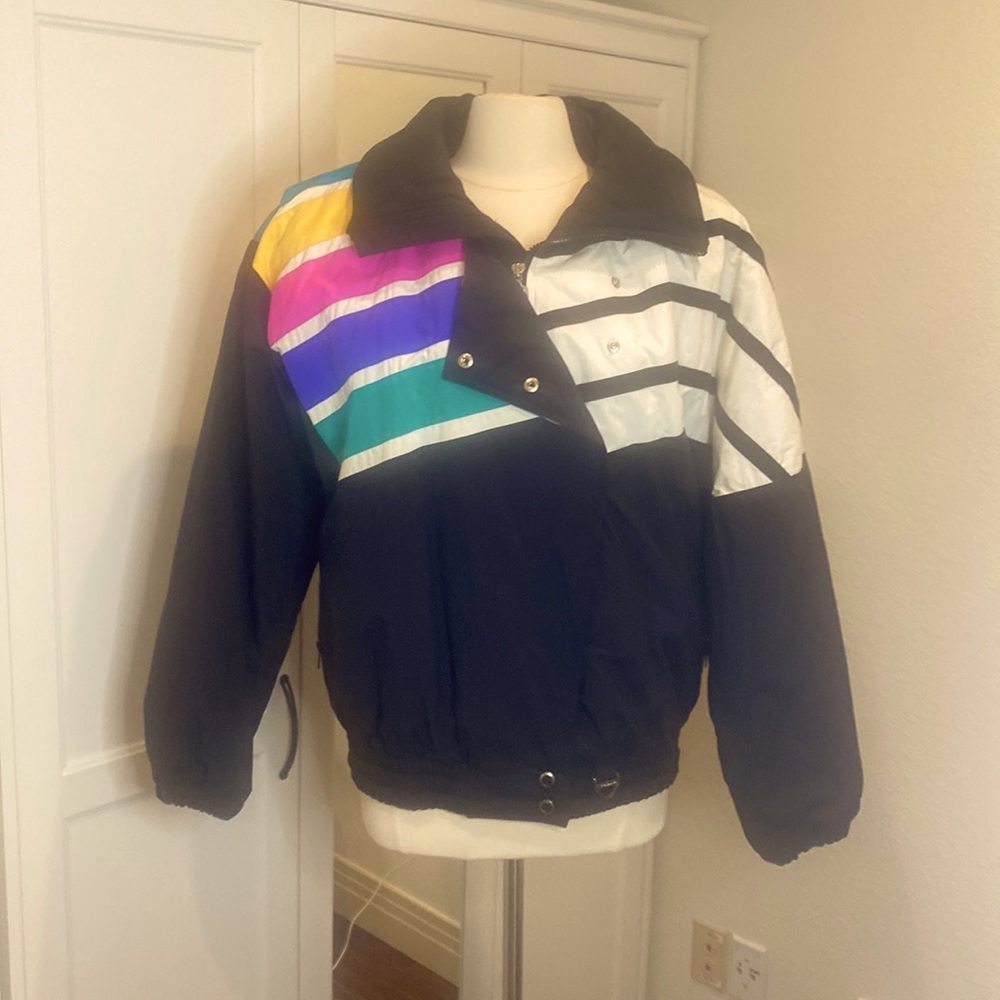 TYROLIA VINTAGE BLACK RAINBOW SKI PARKA.